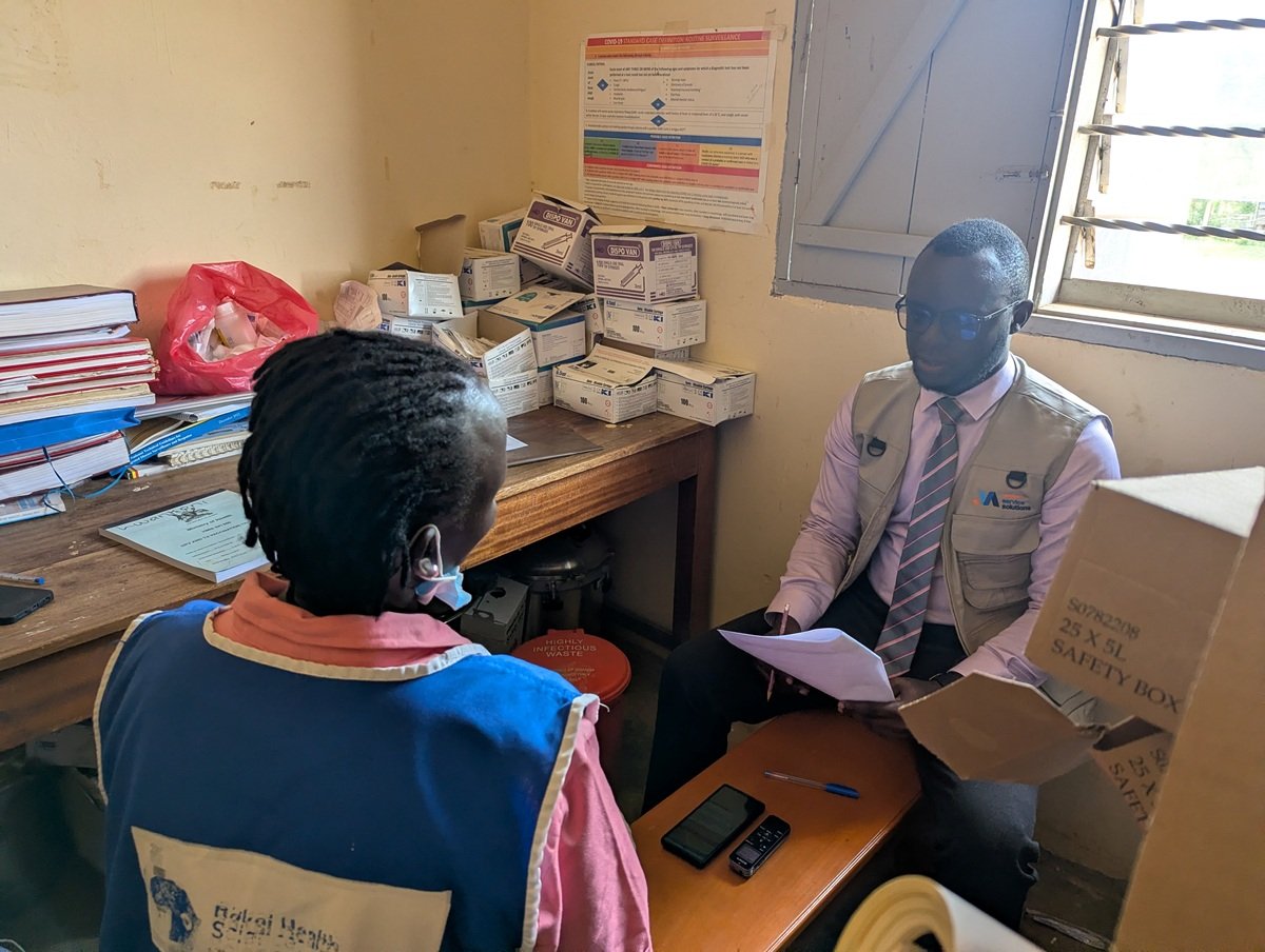 Melmo Team interviewing Health Incharge delegate at Lwankoni HCIII.jpg